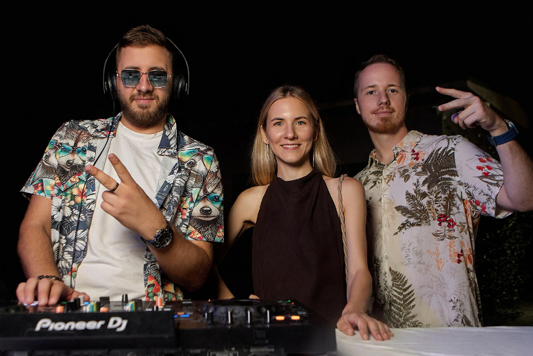 Ivan Shumilov, Regional Head of Sales for Asia, and Dimitri Marutiani, Account Manager, playing their mixes as DJs at the EvenBet offline corporate party. Belek, Turkey, 2025. Photo.